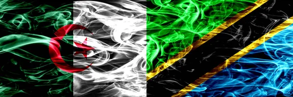 阿尔及利亚 阿尔及利亚 坦桑尼亚 坦桑尼亚的烟雾旗并排放置 概念和想法标志混合 — 图库照片