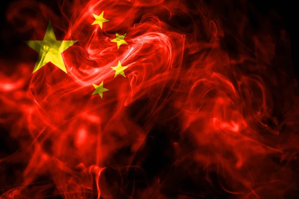 National flag of China made from colored smoke isolated on black background. Abstract silky wave background.