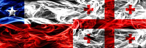 Чили Чили Против Грузии Грузинские Дымовые Флаги Размещенные Бок Бок — стоковое фото