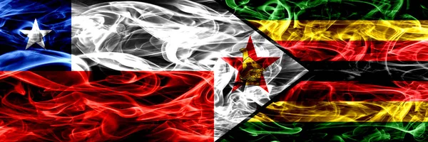 Chile Chilean Zimbabwe Zimbabwean Smoke Flags Placed Side Side Concept — Stock Photo, Image