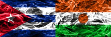 Küba, Küba vs Nijer, Nijerya bayrakları yan yana yerleştirilmiş duman. Kavram ve fikir bayrakları mix