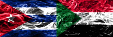 Küba, Küba vs Sudan, sudan duman bayrakları yan yana yerleştirilmiş. Kavram ve fikir bayrakları mix