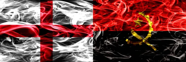 Англия Против Анголы Ангольские Дымовые Флаги Размещенные Бок Бок Толстые — стоковое фото