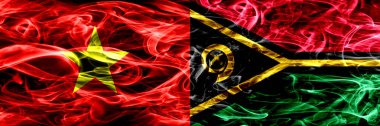 Sosyalist Cumhuriyeti Vietnam vs Vanuatu bayrakları yan yana yerleştirilmiş duman. Vietnam ve Vanuatu ipeksi duman bayrakları renkli kalın