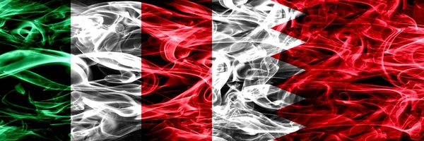 Италия Против Бахрейна Бахранийские Дымовые Флаги Размещенные Бок Бок Толстые — стоковое фото