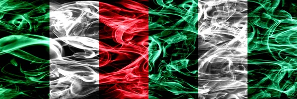 Ιταλία Νιγηρία Νιγηριανός Καπνίζουν Σημαίες Που Τοποθετούνται Δίπλα Δίπλα Παχύ — Φωτογραφία Αρχείου