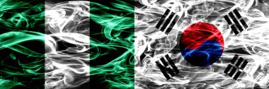 Nijerya, Nijerya vs Güney Kore, Kore duman bayrakları yan yana yerleştirilmiş. İpeksi duman bayrakları renkli kalın soyut