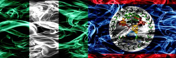 Nigéria Nigeriano Belize Bandeiras Fumaça Belizenhas Colocadas Lado Lado Bandeiras — Fotografia de Stock