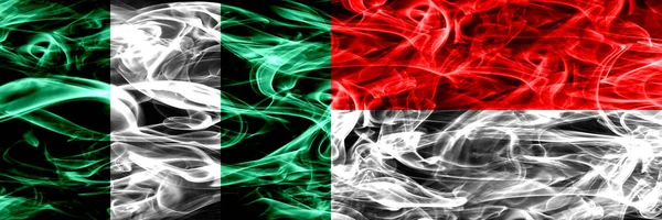 Nigeria Nigerian Indonesia Indonesian Smoke Flags Placed Side Side Thick — Stock Photo, Image