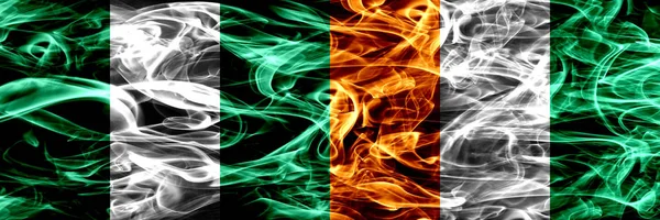 Нигерия Нигерия Против Дымовых Флагов Кот Ивуара Расположенных Бок Бок — стоковое фото