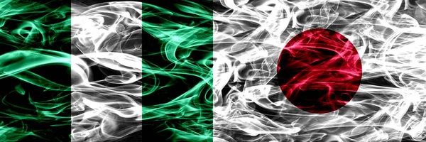 Nigeria Nigeria Contro Giappone Bandiere Fumogene Giapponesi Affiancate Bandiere Fumo — Foto Stock
