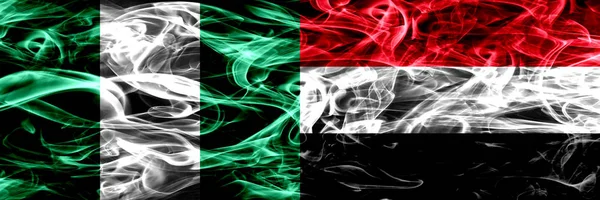 Nigeria Nigerian Yemen Yemeni Smoke Flags Placed Side Side Thick — Stock Photo, Image