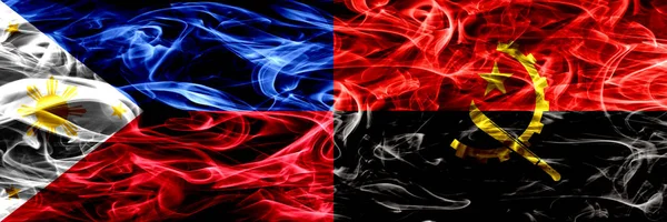 Филиппины Против Анголы Ангольские Дымовые Флаги Размещенные Бок Бок Толстые — стоковое фото
