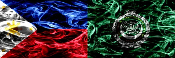 Philippines vs Arab League smoke flags placed side by side. Thick abstract colored silky smoke flags