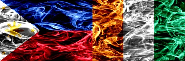 Philippines Ivory Coast Smoke Flags Placed Side Side Thick Abstract — Stock Photo, Image