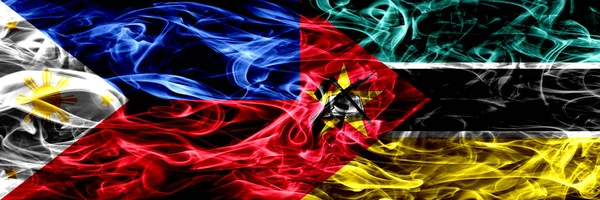 Филиппины Против Мозамбика Мозамбикские Дымовые Флаги Размещенные Бок Бок Толстые — стоковое фото
