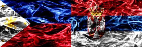 Филиппины Против Сербии Сербские Дымовые Флаги Размещенные Бок Бок Толстые — стоковое фото
