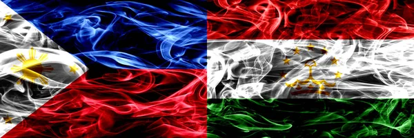 Филиппины Против Таджикистана Таджикские Дымовые Флаги Размещенные Бок Бок Толстые — стоковое фото