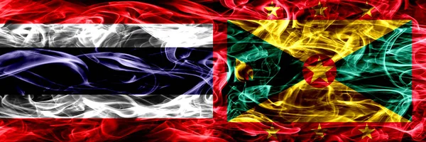 Tayland vs Grenada duman bayrakları yan yana yerleştirilmiş. İpeksi duman bayrakları renkli kalın soyut