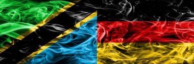 Tanzanya – Almanya, Alman bayrakları yan yana yerleştirilmiş duman. Tanzanya ve Almanya, Alman ipeksi duman bayrakları kalın renkli