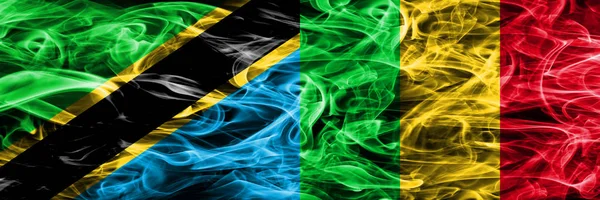 Танзания Против Малийских Дымовых Флагов Размещенных Бок Бок Толстые Шёлковые — стоковое фото