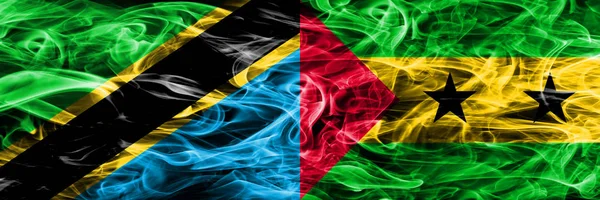 タンザニア対サントメ プリンシペ煙サイド サイド配置フラグ 厚い色の絹のような煙フラグはタンザニアとサントメ プリンシペ — ストック写真