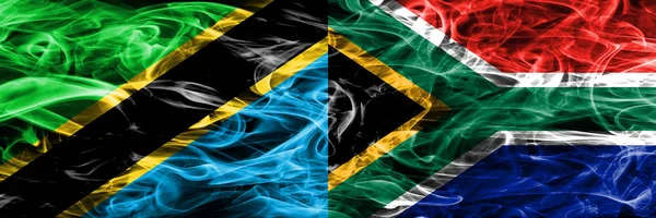 坦桑尼亚对南非 非洲的烟旗并排放置 厚彩色的坦桑尼亚和南非的丝质烟旗 — 图库照片