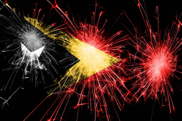 East Timor fireworks sparkling flag. New Year, Christmas and National day concept