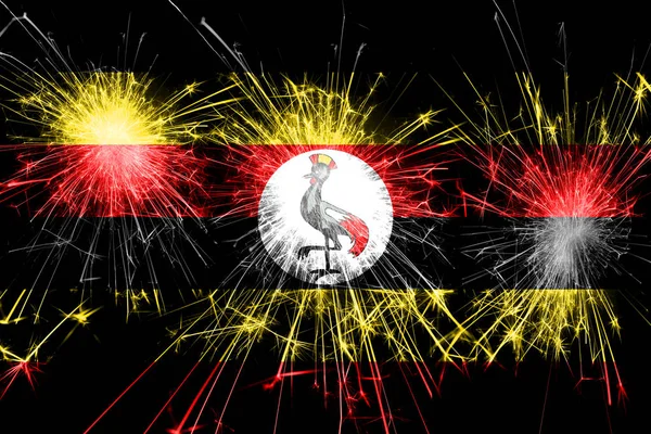 乌干达烟花闪闪发光的旗帜 圣诞节和国庆节概念 — 图库照片