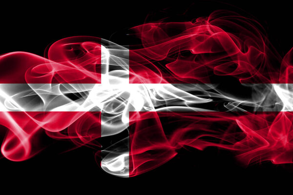 National flag of Denmark made from colored smoke isolated on black background