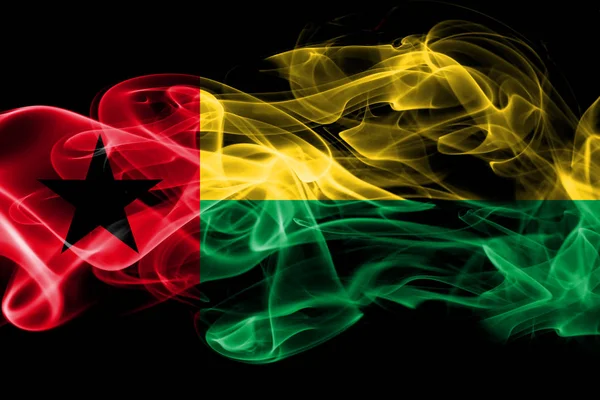 从黑色背景上隔离的有色烟雾制成的几内亚比绍国旗 — 图库照片
