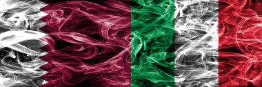 Katar rakip İtalya, İtalyanca bayrakları yan yana yerleştirilmiş duman. Birleşik Arap Emirlikleri. Birleşik Arap Emirlikleri