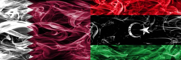 Qatar Líbia Bandeiras Fumaça Líbias Colocadas Lado Lado Emirados Árabes — Fotografia de Stock