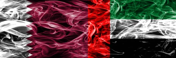 Qatar United Arab Emirates Emirati Smoke Flags Placed Side Side — Stock Photo, Image