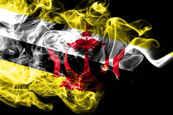 National flag of Brunei made from colored smoke isolated on black background. Abstract silky wave background. — Stock Photo, Image