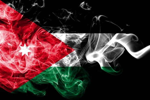 National flag of Jordan made from colored smoke isolated on black background. Abstract silky wave background. — Stock Photo, Image