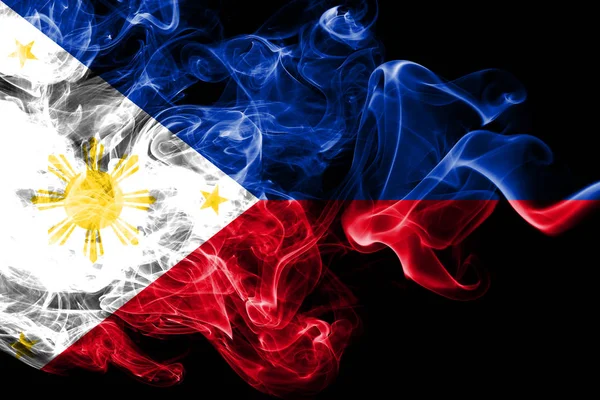 フィリピンの国旗は、黒の背景に分離された色の煙から作られました。抽象的な絹のような波の背景. — ストック写真