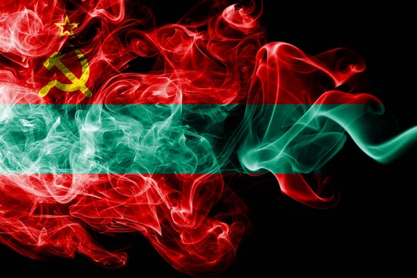 Національний Прапор Придністровської Молдавської Республіки, зроблені з кольоровим димом, ізольовані на чорному тлі. Анотація шовковистою хвиля фону. — стокове фото