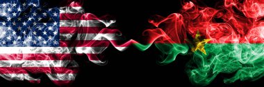 Amerika Birleşik Devletleri rakip Burkina Faso dumanlı mistik bayrakları yan yana yerleştirilmiş. Amerika ve Burkina Faso ipeksi duman bayrakları renkli kalın