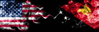 Amerika Birleşik Devletleri vs Papua Yeni Gine dumanlı mistik bayrakları yan yana yerleştirilmiş. Amerika ve Papua Yeni Gine ipeksi duman bayrakları renkli kalın