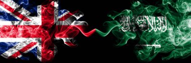 İngiltere vs Suudi Arabistan, Arap dumanlı mistik bayrakları yan yana yerleştirilmiş. Büyük Britanya ve Suudi Arabistan, Arap ipeksi duman bayrakları renkli kalın.