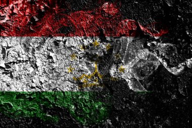 Eski kirli duvar arka planda Tacikistan dumanlı mistik bayrağı