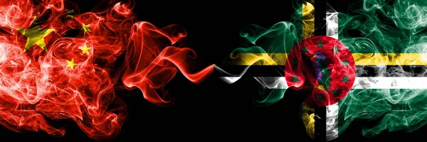 China vs Dominica smoke flags placed side by side. Thick colored silky smoke flags of Chinese and Dominica — Stock Photo, Image