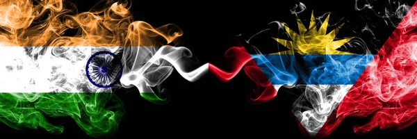 India vs Antigua and Barbuda smoke flags placed side by side. Thick colored silky smoke flags of Indian and Antigua and Barbuda