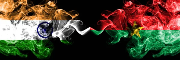 印度对布基纳法索的烟旗并排飘扬。印度和布基纳法索厚彩色丝质烟旗 — 图库照片