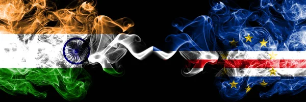 India vs Cape Verde smoke flags placed side by side. Thick colored silky smoke flags of Indian and Cape Verde