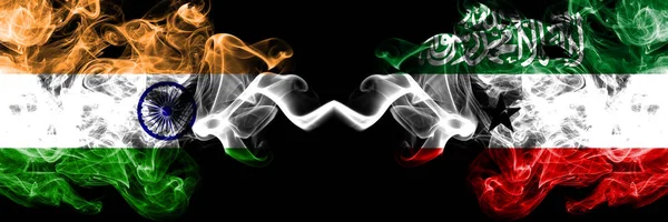 India vs Somaliland smoke flags placed side by side. Thick colored silky smoke flags of Indian and Somaliland