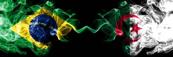 Brazil vs Algeria, Algerian smoke flags placed side by side. Thick colored silky smoke flags of Brazilian and Algeria, Algerian — Stock Photo, Image