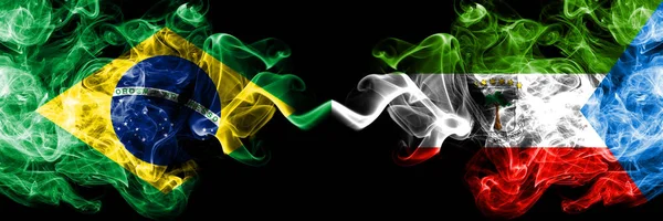 Brazil vs Equatorial Guinea smoke flags placed side by side. Thick colored silky smoke flags of Brazilian and Equatorial Guinea — Stock Photo, Image