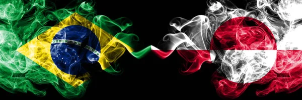 Brazil vs Greenland smoke flags placed side by side. Thick colored silky smoke flags of Brazilian and Greenland — Stock Photo, Image